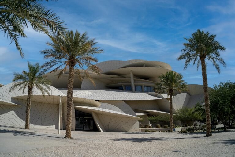Explore the stunning modern design of the National Museum of Qatar in Doha. A captivating architectural masterpiece.